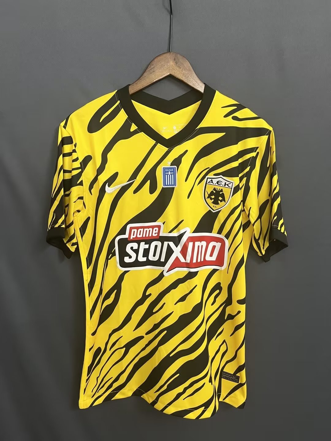 AEK F.C. 22-23 AEK Yellow Style 2 Soccer Jersey sports jersey product view 1