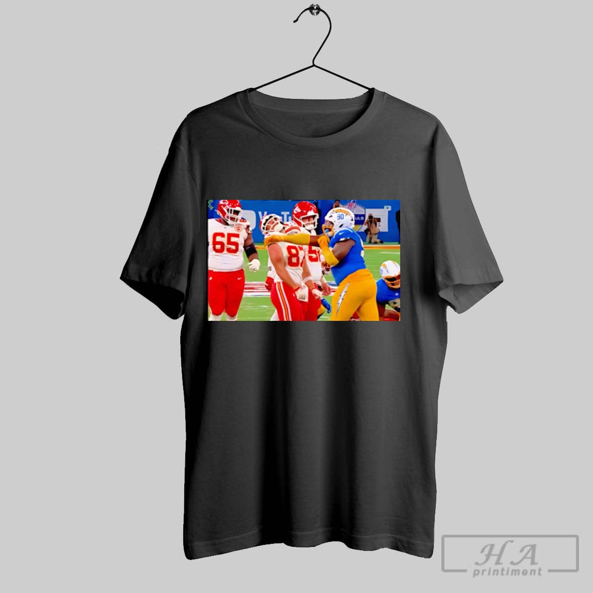 Official Chargers Player Slapped Travis Kelce In The Face Poster Unisex T-shirt, Sweatshirt, Hoodie, Long Sleeve Tee - T-Shirt, Sweatshirt, Hoodie