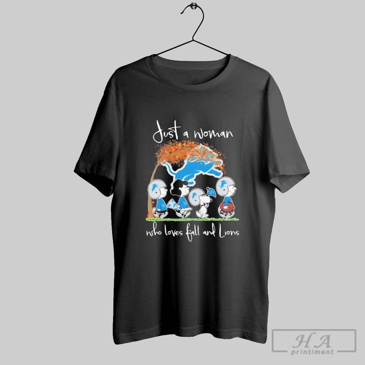 Official Just A Woman Who Loves Fall And Detroit Lions X The Peanuts Walking Unisex T-shirt, Sweatshirt, Hoodie, Long Sleeve Tee - T-Shirt, Sweatshirt, Hoodie