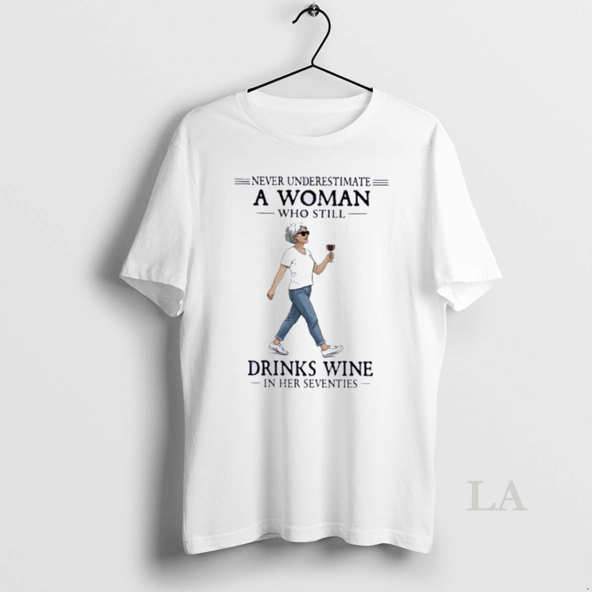 Original Never Underestimate A Woman Who Still Drinks Wine In Her Seventies 2026 Unisex T-shirt, Sweatshirt, Hoodie, Long Sleeve Tee - T-Shirt, Sweatshirt, Hoodie