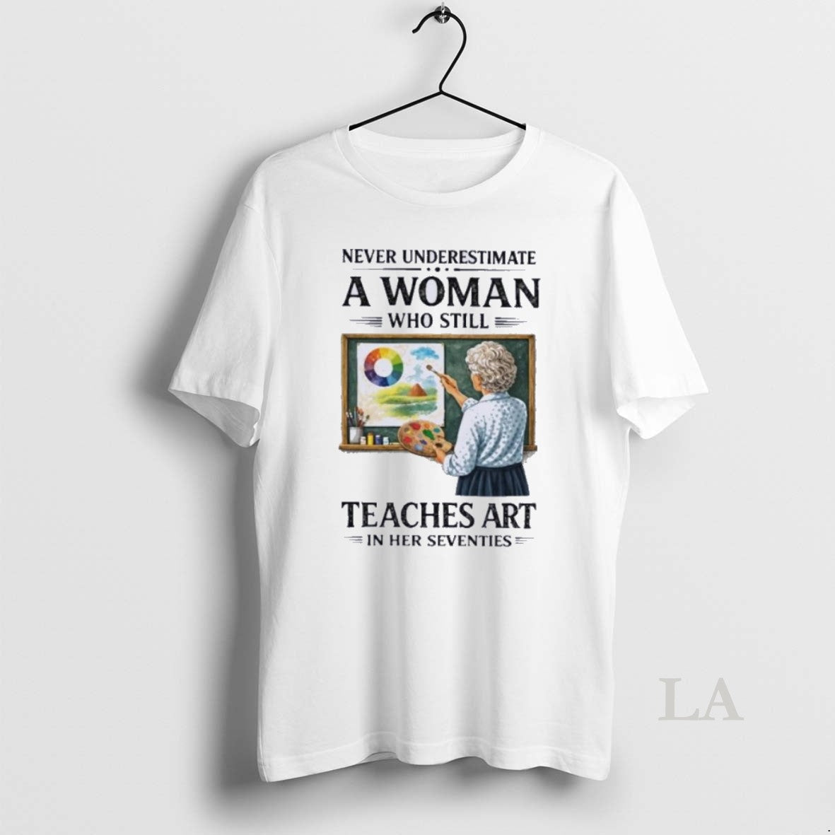 Original Never Underestimate A Woman Who Still Teaches Art In Her Seventies Unisex T-shirt, Sweatshirt, Hoodie, Long Sleeve Tee - T-Shirt, Sweatshirt, Hoodie
