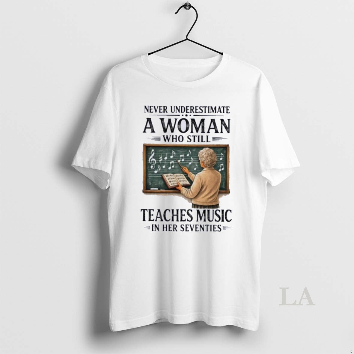 Original Never Underestimate A Woman Who Still Teaches Music In Her Seventies Unisex T-shirt, Sweatshirt, Hoodie, Long Sleeve Tee - T-Shirt, Sweatshirt, Hoodie