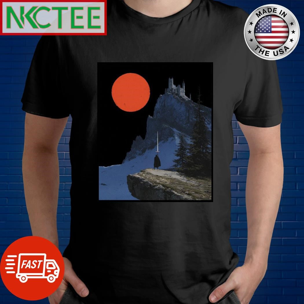 Robed figure wielding a glowing sword, overlooking a snow-dusted mountain with a castle perched atop, under a large, red celestial body shirt - T-Shirt, Sweatshirt, Hoodie