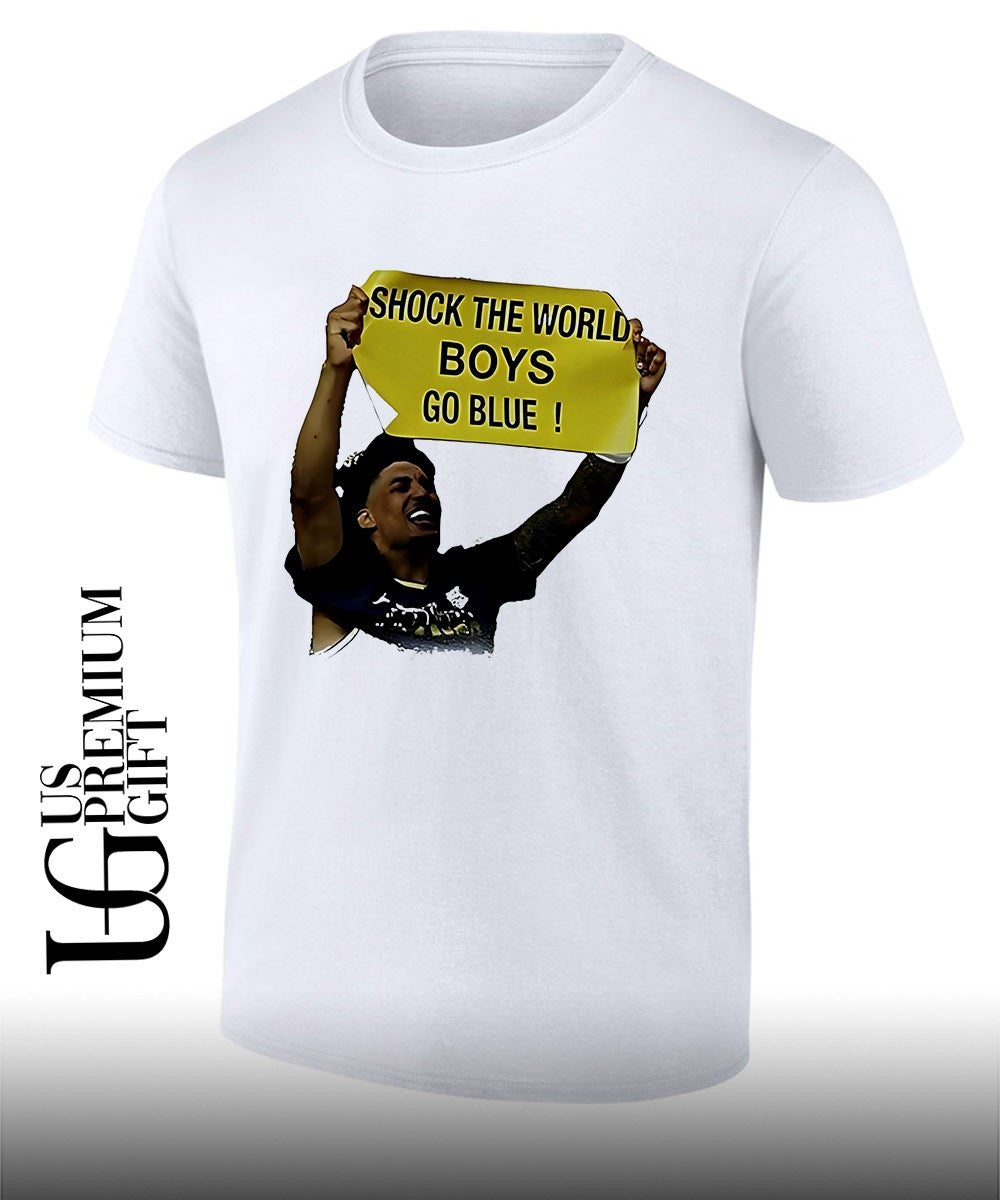 Shock The World Boys Go Blue Michigan Wolverines Basketball 2026 banner shirt Unisex T-shirt, Sweatshirt, Hoodie, Long Sleeve Tee - T-Shirt, Sweatshirt, Hoodie