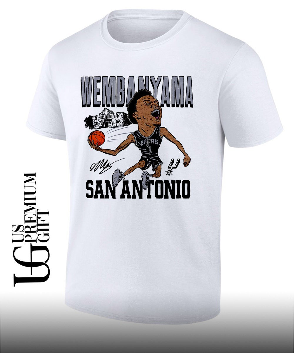 WEMBANYAMA Victor Wembanyama shouting celebrating holding basketball San Antonio Spurs 2024 NBA caricature graphic shirt - T-Shirt, Sweatshirt, Hoodie