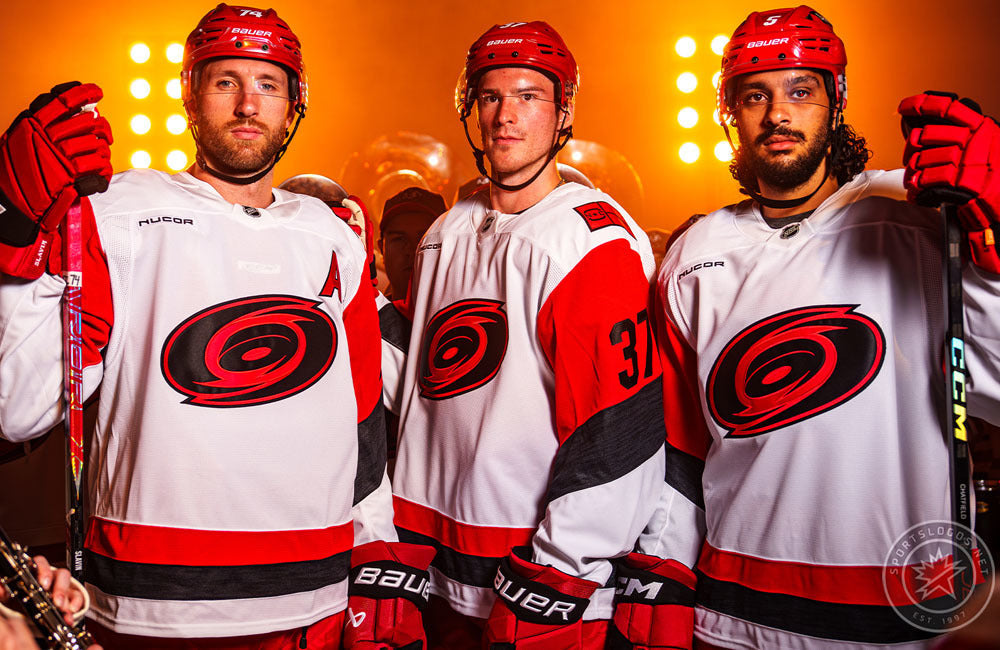 carolina-hurricanes-new-road-white-uniforms-2025-26-sportslogosnet Hockey Jersey hockey jersey product view 1