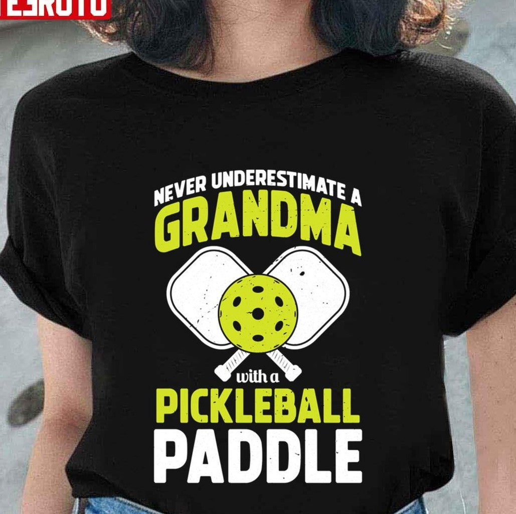 Never Underestimate A Grandma Funny Pickle Ball Player Gift Unisex T-shirt - T-Shirt, Sweatshirt, Hoodie