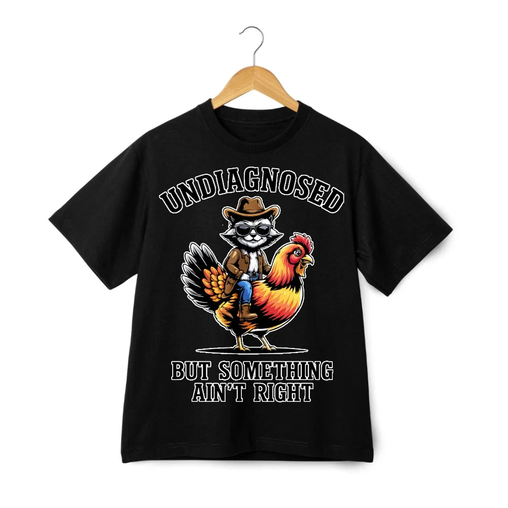 Undiagnosed Cowboy Cat Riding Chicken Print T-Shirt, Funny Western Casual Tee Unisex T-shirt, Sweatshirt, Hoodie, Long Sleeve Tee - T-Shirt, Sweatshirt, Hoodie