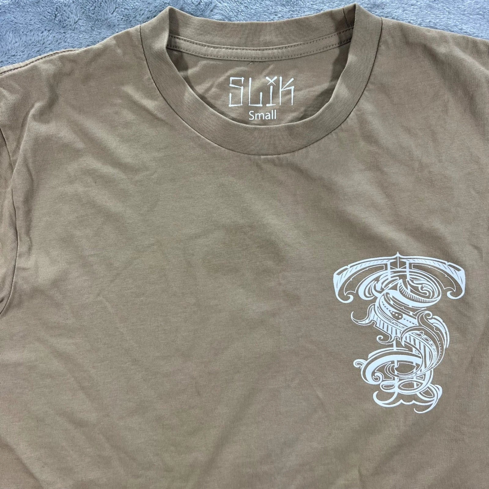 SLIK Graphic T-Shirt Mens Small Tan Ornate Scrollwork Logo Tee Casual Cotton Unisex T-shirt, Sweatshirt, Hoodie, Long Sleeve Tee - T-Shirt, Sweatshirt, Hoodie