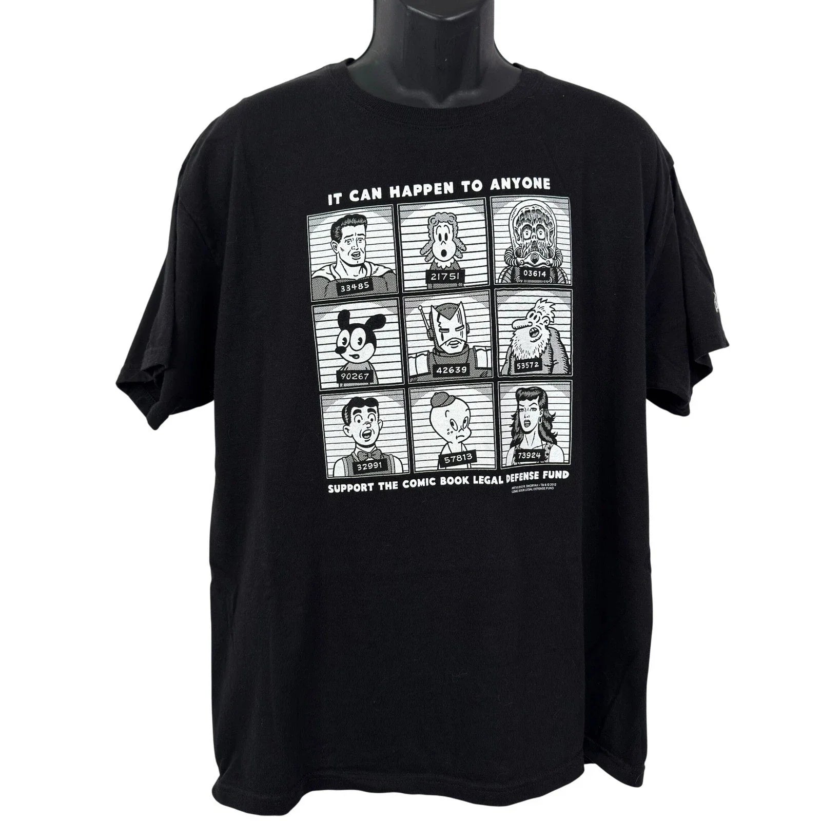 2012 Comic Book Legal Defense Fund Graphic Tee Black Mens Large Unisex T-shirt, Sweatshirt, Hoodie, Long Sleeve Tee - T-Shirt, Sweatshirt, Hoodie