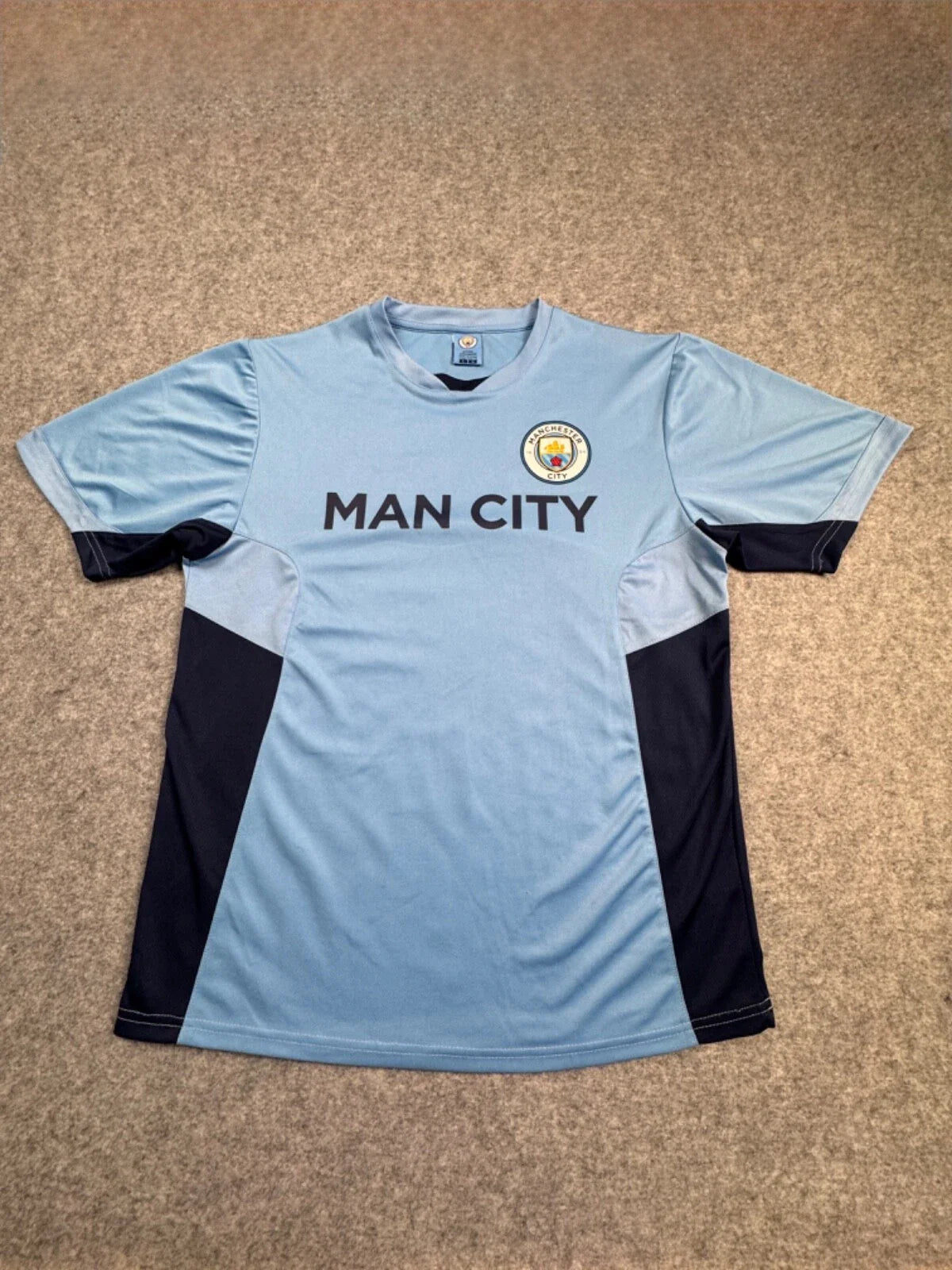 Official Merchandise Blue Jersey Manchester City Soccer Futbol Patch Shirt MED Unisex T-shirt, Sweatshirt, Hoodie, Long Sleeve Tee - T-Shirt, Sweatshirt, Hoodie