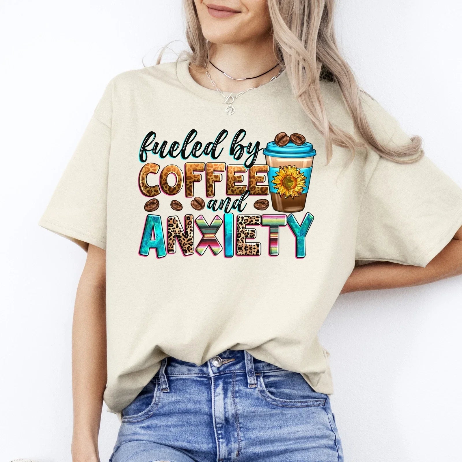 Fueled by coffee and anxiety T-Shirt gift Sunflower coffee lover Unisex tee Sand Unisex T-shirt, Sweatshirt, Hoodie, Long Sleeve Tee - T-Shirt, Sweatshirt, Hoodie