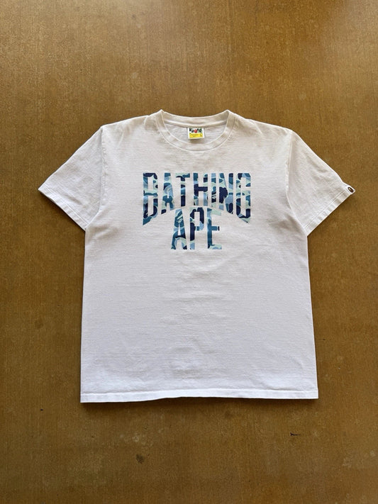 A Bathing Ape Nigo NYC Camouflage Spell Out Streetwear Skater BAPE T-Shirt (L) Unisex T-shirt, Sweatshirt, Hoodie, Long Sleeve Tee - T-Shirt, Sweatshirt, Hoodie