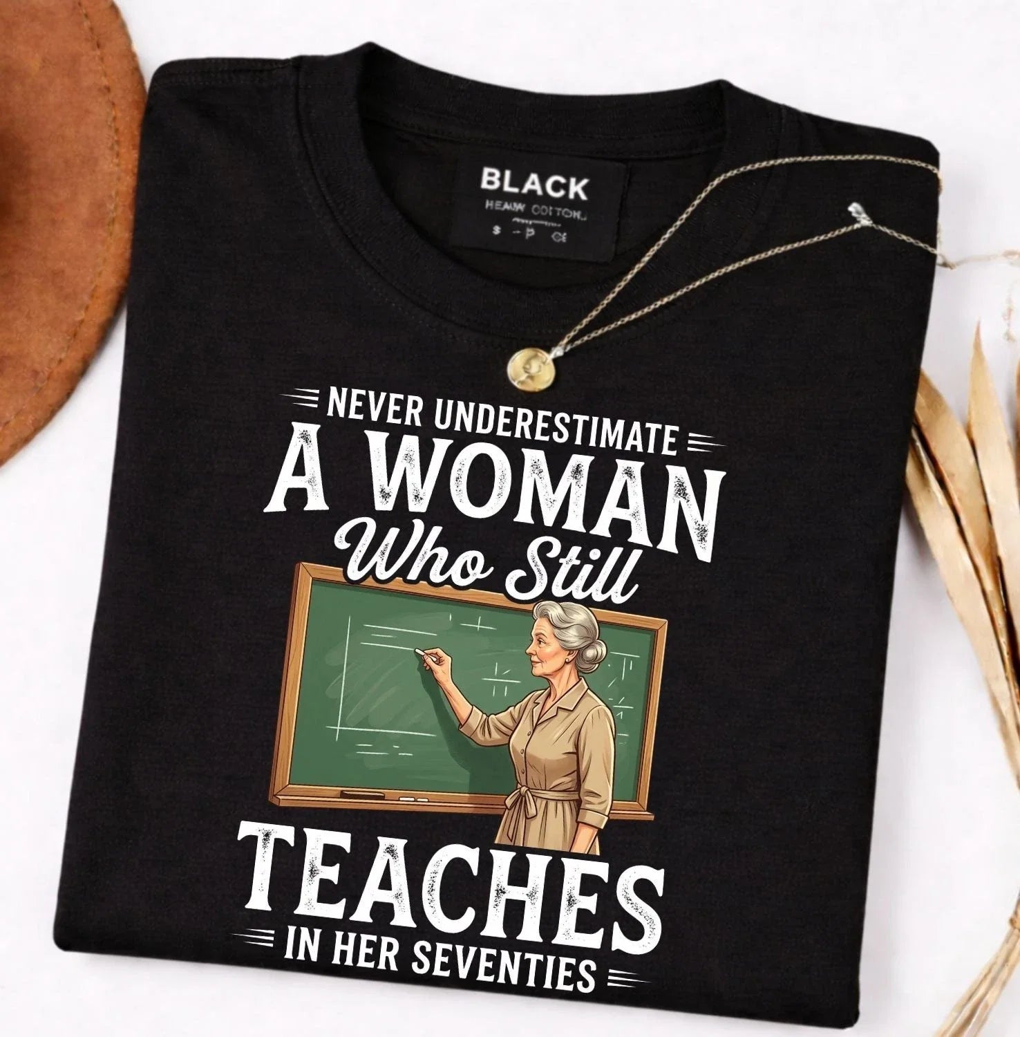 Never Underestimate A Woman Who Still Teaches In Her Seventies Vintage Tee Unisex T-shirt, Sweatshirt, Hoodie, Long Sleeve Tee - T-Shirt, Sweatshirt, Hoodie