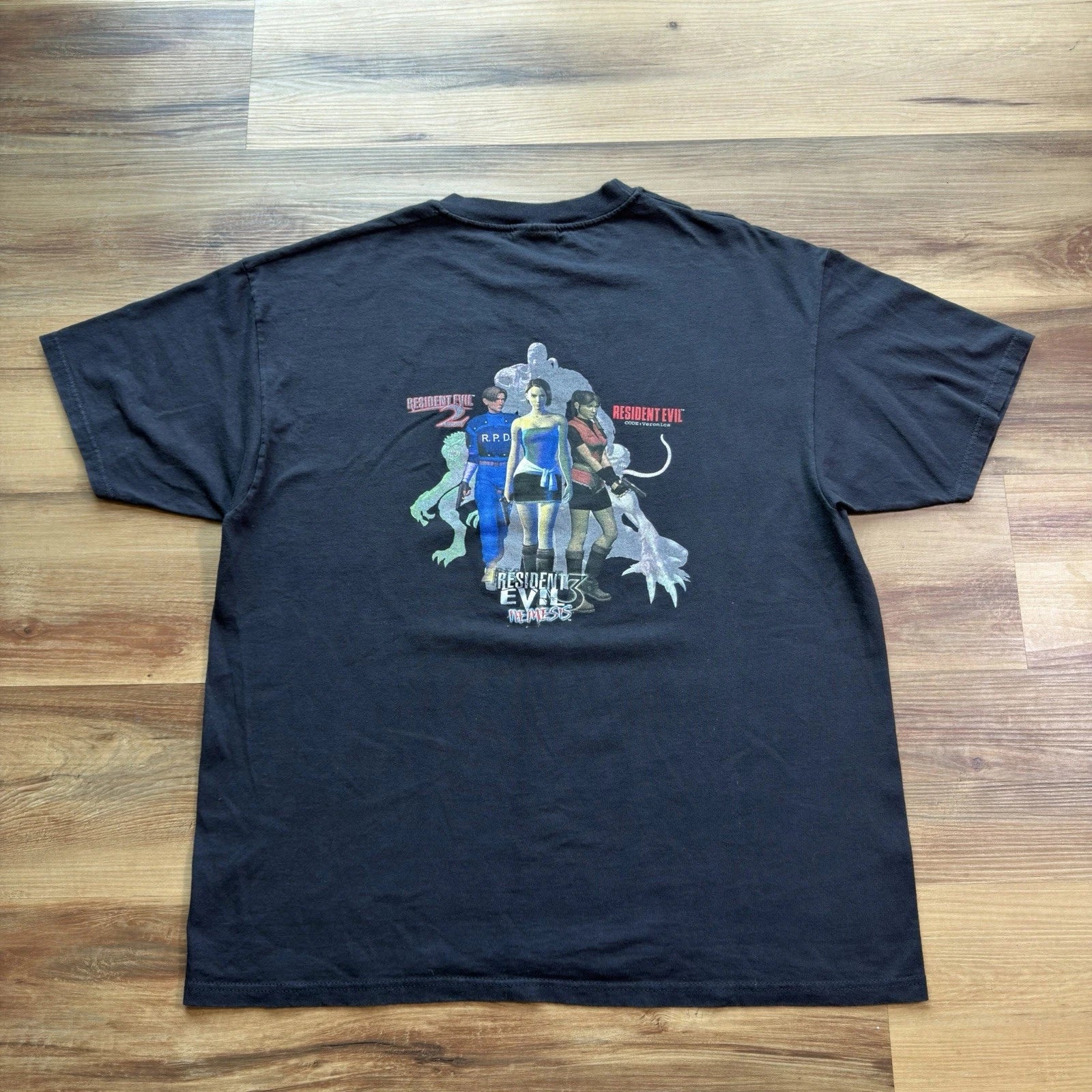 Vintage Resident Evil Nemesis CAPCOM Logo Graphic Video Game Promo Tee Black XL Unisex T-shirt, Sweatshirt, Hoodie, Long Sleeve Tee - T-Shirt, Sweatshirt, Hoodie