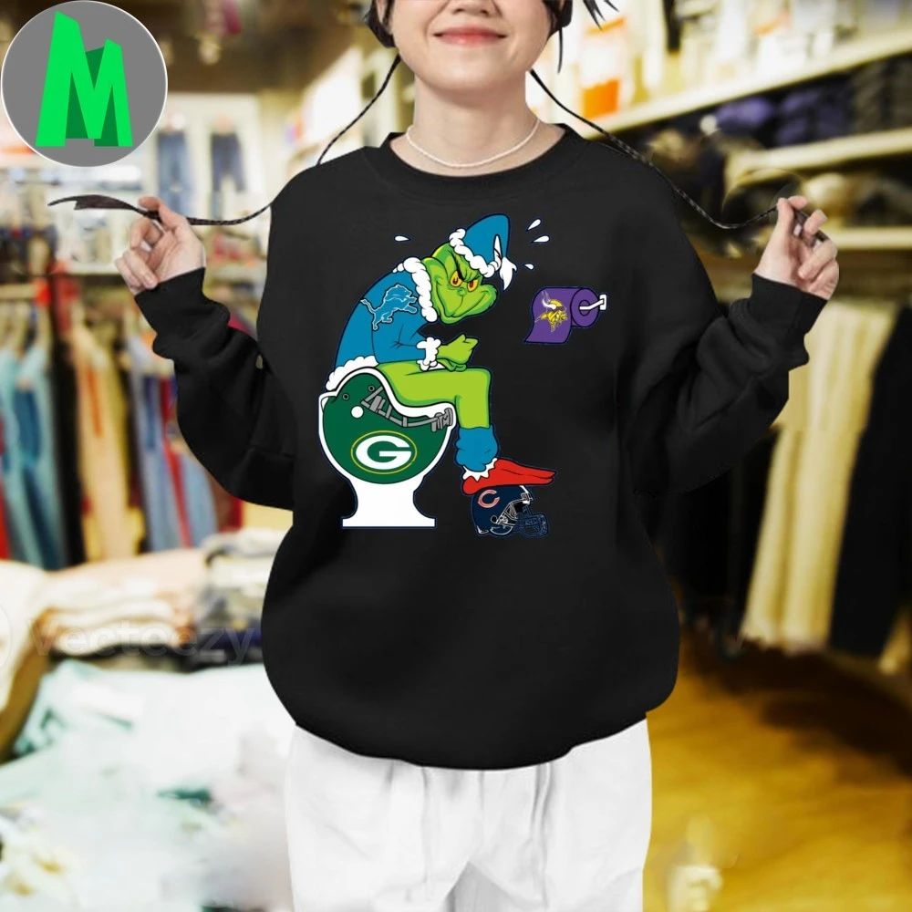The Grinch wears a Detroit Lions jersey He sits on a Green Bay toilet And uses toilet paper with the Minnesota Vikings logo Shirt football jersey product view 3